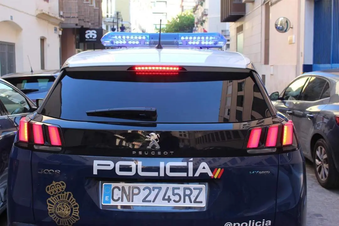 Polic&iacute;a Nacional. - EP