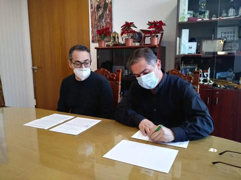 Firma del convenio. - 