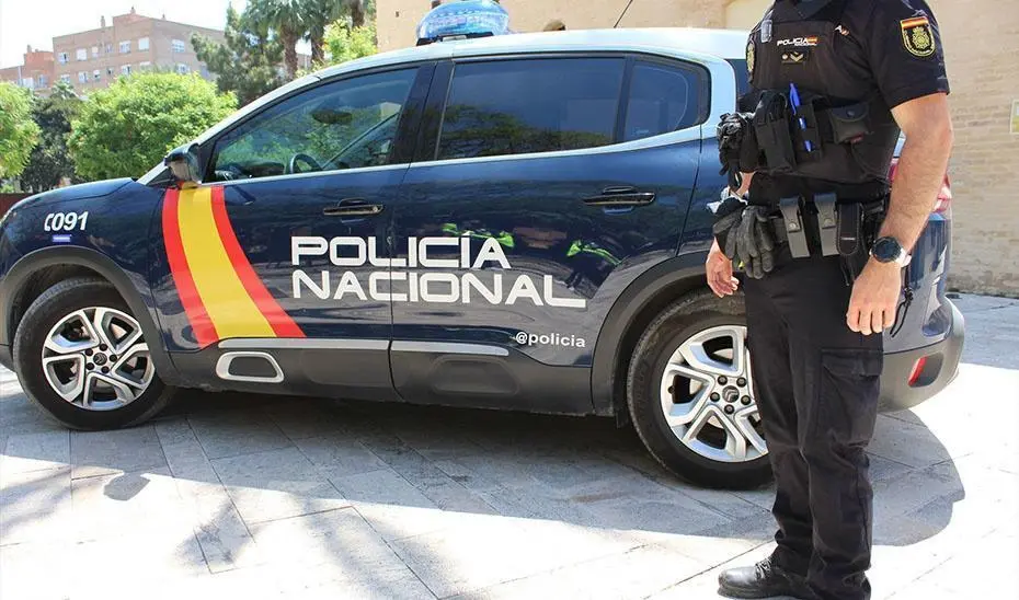 Polic&iacute;a Nacional. - EP