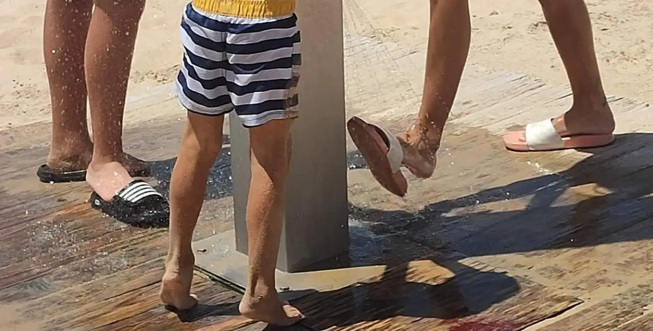 Duchas en la playa. - Barriento