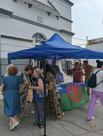 Mesa informativa del programa Picga en Taraguilla. - AI