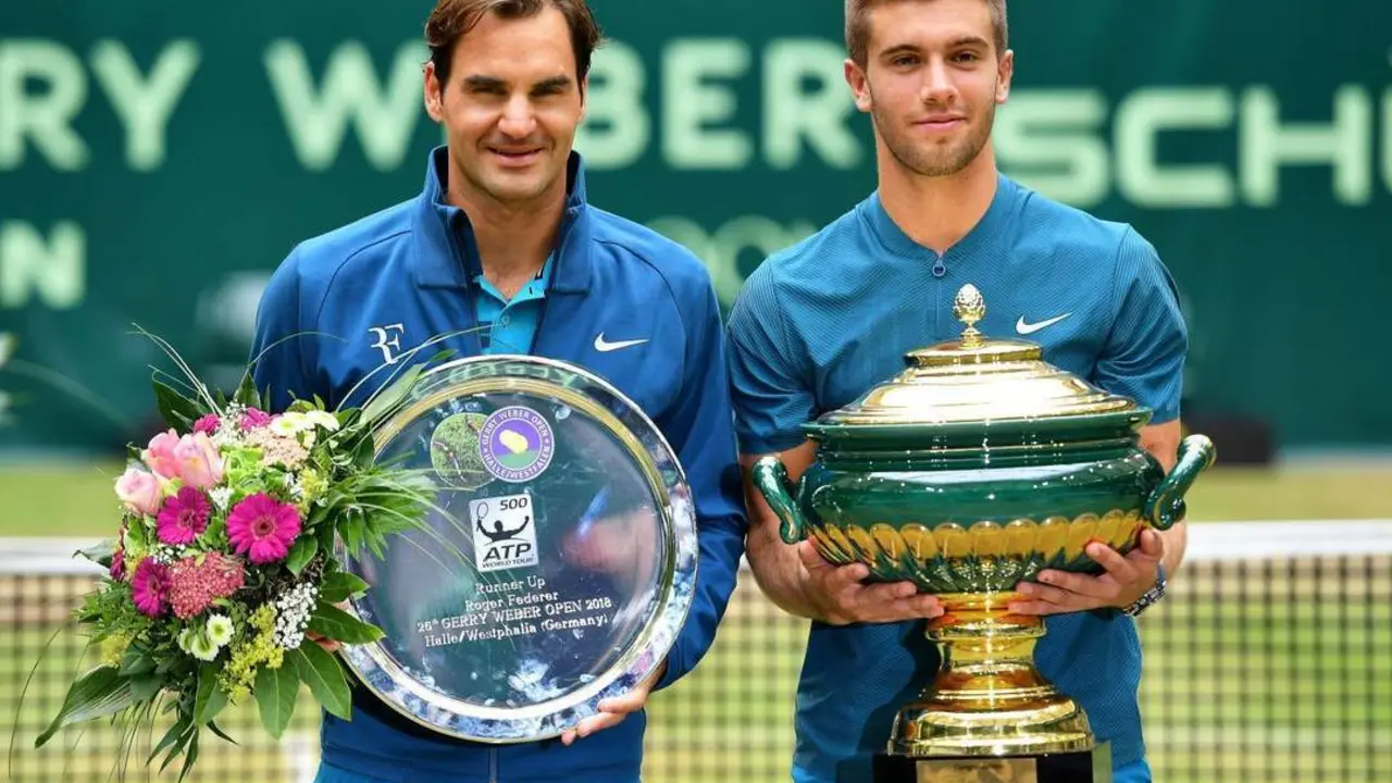 Coric y Federer. - EFE