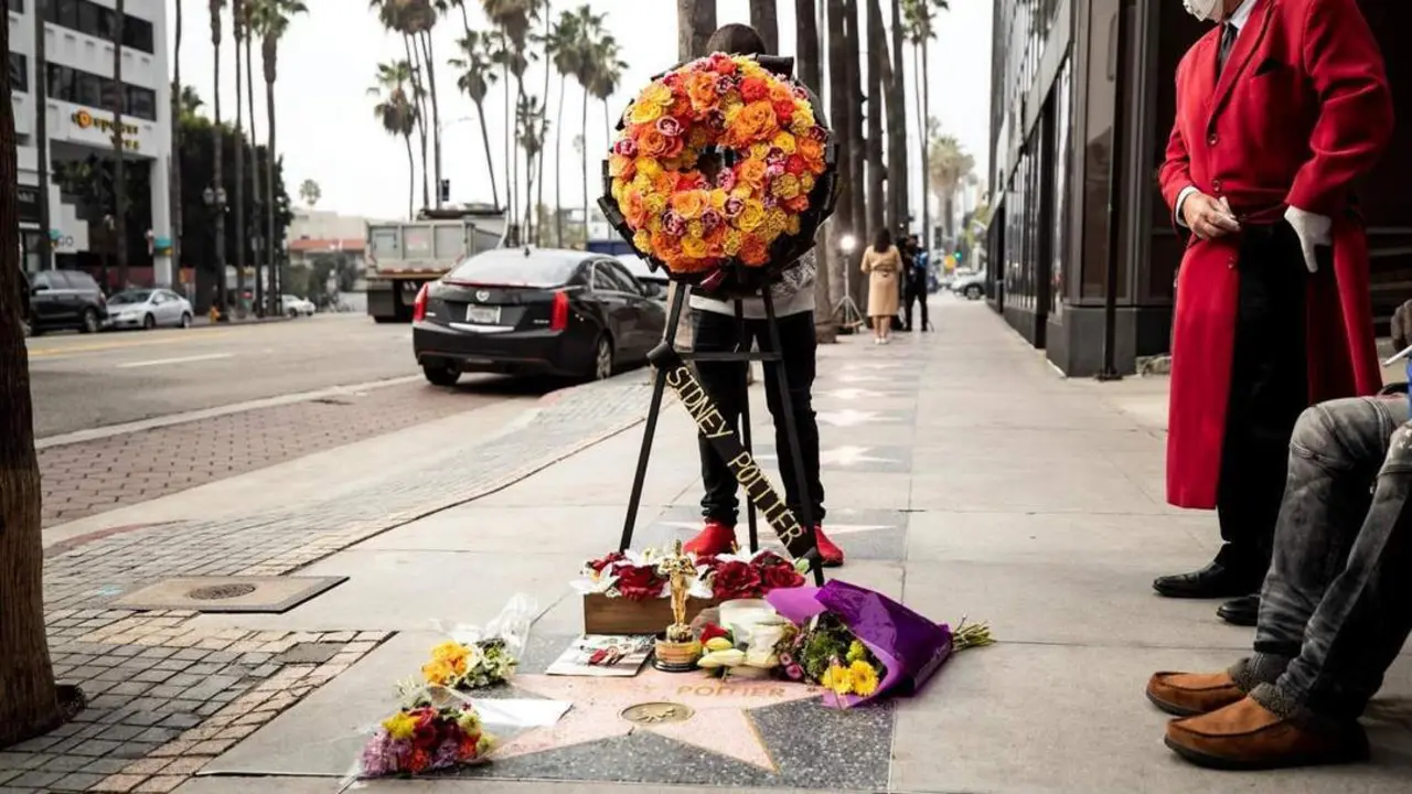 Flores junto a su estrella. - EFE