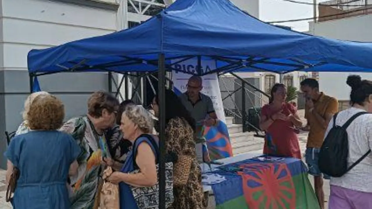 Mesa informativa del programa Picga en Taraguilla. - AI