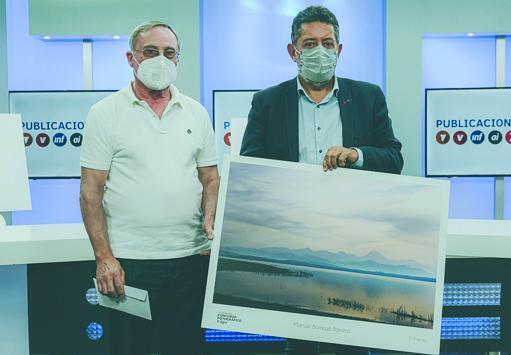 Manuel Borrego, tercer premio por un amanecer en el pantano de Bornos